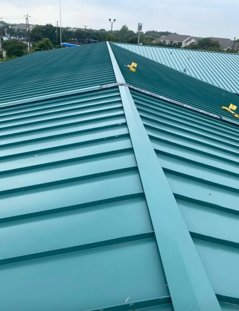 Green commercial metal roof ridge and valley for Metal Roof Repair in Belfast